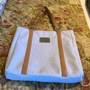 15.5” X 16” Calvin Klein Tote.  White with Tan gold accents.